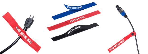 Five reusable hook and loop cable ties in red black and blue each labeled YOUR BRAND HERE are shown holding electrical cords and displayed separately on a white background