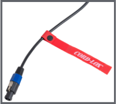 A black cable with a blue and black connector secured by a red Cord Lox strap with white text against a light gray background