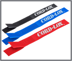 Three reusable hook and loop cable straps in black blue and red each labeled CORD LOX in white text are arranged diagonally on a white background