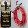 A man carries a coiled cord with a Cord Lox® HangMaster™ Heavy Duty Strap while a red hose hangs neatly nearby Text notes the ProSeries is professional strength weatherproof and easy to use or re use for cable and hose storage